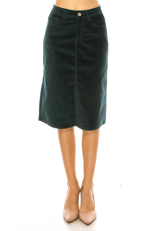 model wears green velvet skirt