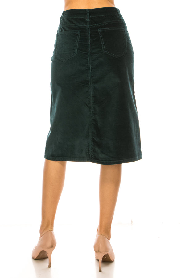 model wears green velvet skirt