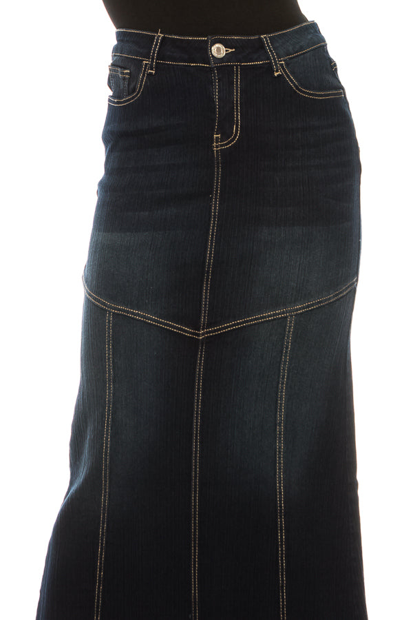model wears dark indigo wash denim skirt
